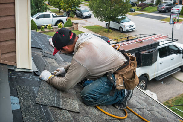 Professional Emergency Roof Repair technician working in Bridgehampton, NY